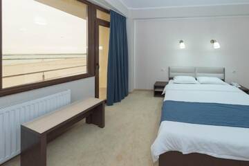 Фото номера Двухместный номер с 1 кроватью с видом на море Отель Hotel Promenada г. Мамая 6