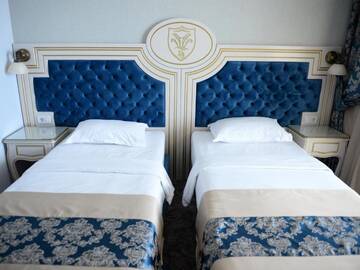 Фото номера Двухместный номер с 2 отдельными кроватями и видом на море Отель Hotel Dacia Sud г. Мамая 17