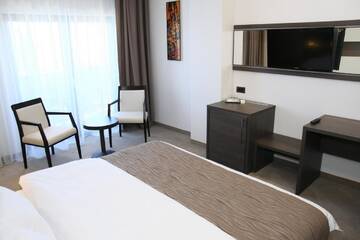 Фото номера Стандартный двухместный номер с 1 кроватью Отель Hotel Scapino г. Мамая 6