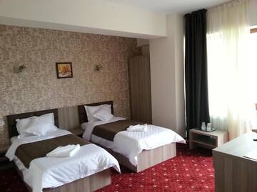 Фото номера Двухместный номер с 2 отдельными кроватями и видом на город Отель Hotel Agapi Mamaia г. Мамая 5