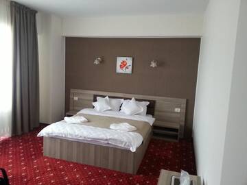 Фото номера Двухместный номер с балконом и боковым видом на море Отель Hotel Agapi Mamaia г. Мамая 4
