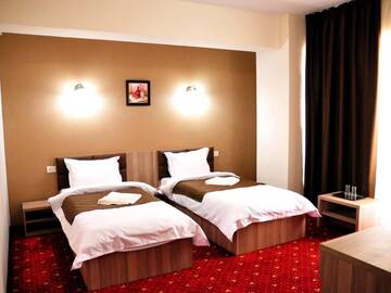 Фото номера Двухместный номер с 2 отдельными кроватями и видом на город Отель Hotel Agapi Mamaia г. Мамая 4