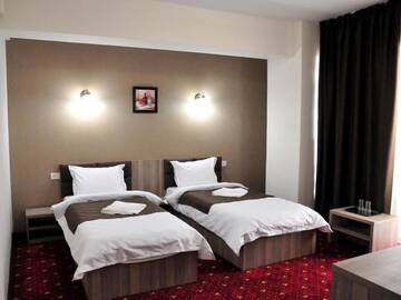 Фото номера Двухместный номер с 2 отдельными кроватями и видом на город Отель Hotel Agapi Mamaia г. Мамая 7