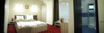 Фото номера Двухместный номер с 2 отдельными кроватями и видом на город Отель Hotel Agapi Mamaia г. Мамая 13