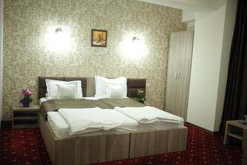 Фото номера Двухместный номер с 2 отдельными кроватями и видом на город Отель Hotel Agapi Mamaia г. Мамая 11