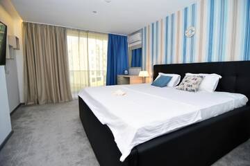Фото номера Двухместный номер с 1 кроватью Отель Vila Zev Mamaia г. Мамая 6