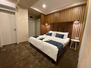 Фото номера Двухместный номер Делюкс с 1 кроватью и балконом Отель Quartz Boutique Hotel г. Мамая 11