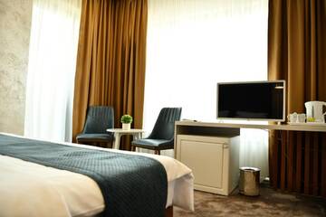 Фото номера Двухместный номер Делюкс с 1 кроватью Отель Quartz Boutique Hotel г. Мамая 4