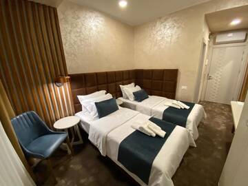 Фото номера Двухместный номер Делюкс с 2 отдельными кроватями Отель Quartz Boutique Hotel г. Мамая 8