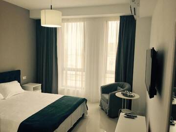 Фото номера Двухместный номер с 1 кроватью Гостевой дом Mamaia Beach Side г. Мамая 12