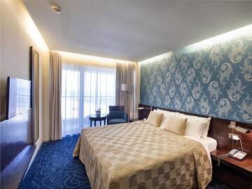 Фото номера Полулюкс с боковым видом на море Отель Vega Hotel г. Мамая 2
